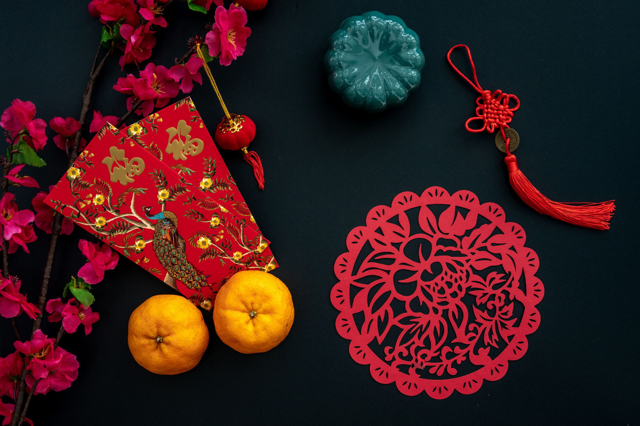 Chinese lunar new year decoration over black background.